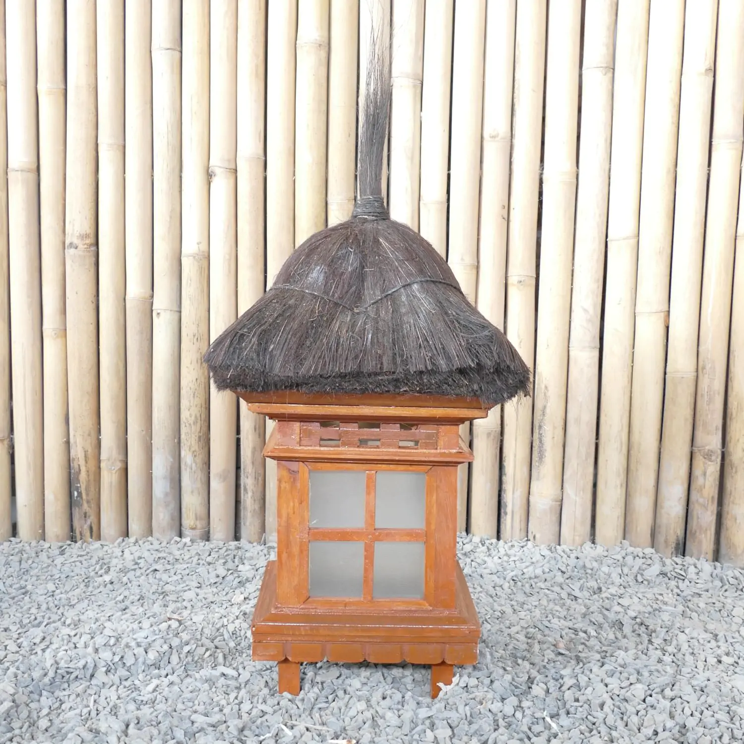  Product image 1 of the product “Balinese Garden Lantern, H 52 cm. Made from wood, glas and natural black grass. ”